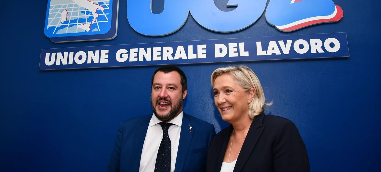 Italy's Interior Minister, Matteo Salvini (L) and leader of France's far-right National Rally (RN) party, Marine Le Pen pose prior to attending a debate on the theme "Economic growth and social prospects in a Europe of Nations" on October 8, 2018 at the headquarters of the Unione Generale del Lavoro (UGL, General Union of Labor) trade union in Rome. (Photo by Alberto PIZZOLI / AFP)